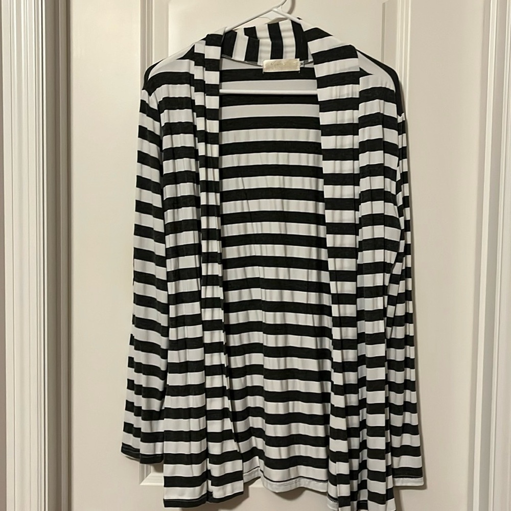 Gray and white cardigan with brown patches on sleeves